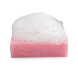 Soap bar with fluffy foam on white background