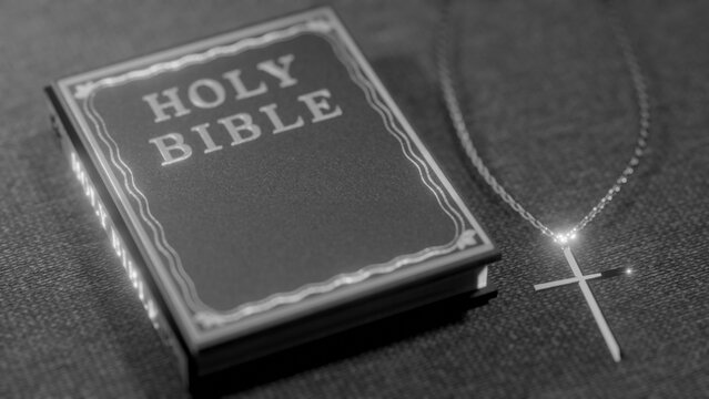 holy book with cross as grey scale version.