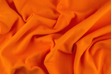 Orange fabric background.