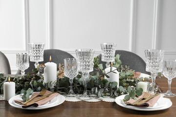 Stylish elegant table setting for festive dinner indoors