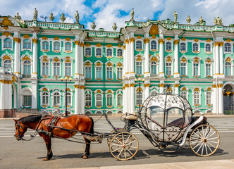 Fototapeta na wymiar Horse carriage on Palace square and Hermitage museum at background, Saint Petersburg, Russia