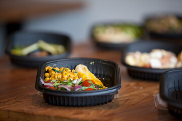 Chicken with chick peas & tomato & onion salad.