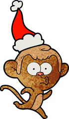 textured cartoon of a surprised monkey wearing santa hat