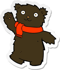 sticker of a cartoon teddy bear wearing scarf