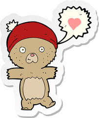 sticker of a cartoon bear in hat