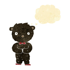 cartoon little black bear with thought bubble