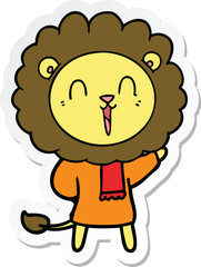 sticker of a laughing lion cartoon in winter clothes