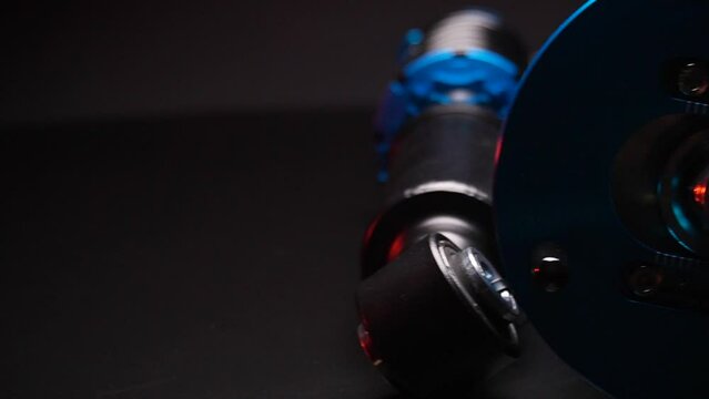 auto suspension tuning coilovers shock absorbers and springs blue for a sports drift car on a dark background