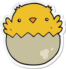 sticker of a cartoon chick hatching from egg