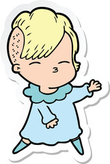 sticker of a cartoon squinting girl