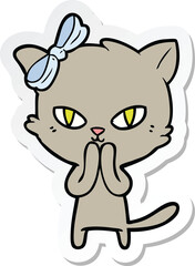 sticker of a cute cartoon cat