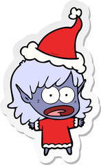 sticker cartoon of a shocked elf girl wearing santa hat