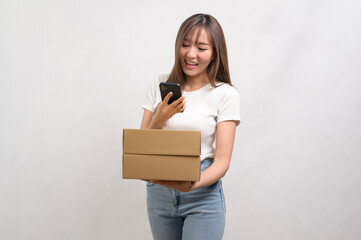 Young asian woman holding paper box and cardbord box over white background, Save earth and delivery concept.