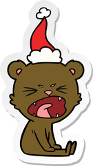 angry sticker cartoon of a bear wearing santa hat