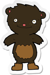 sticker of a cartoon teddy black bear wearing boots