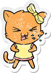 distressed sticker of a cartoon cat