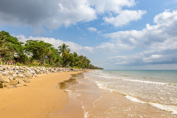 Tropical Coast with white Beach and Palm Trees of Mission Beach, Queensland, Australia .