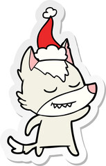 friendly sticker cartoon of a wolf wearing santa hat