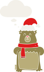cartoon bear wearing christmas hat and thought bubble in retro style