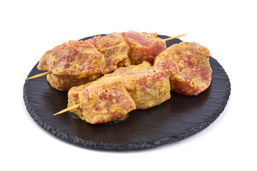Raw pork skewers, ready to cook, kebab BBQ, isolated on white background.