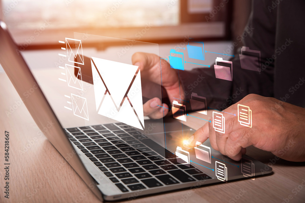 Aufkleber businessman hands using laptop typing on keyboard and surfing the internet on office table with emai