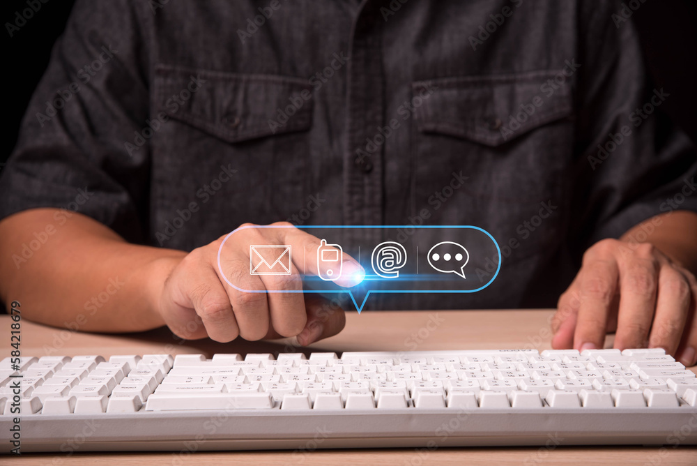 Poster businessman using computer keyboard with the email, call phone, address, chat message icons, custome