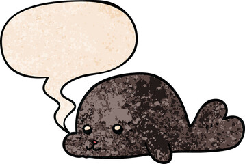 cartoon baby seal and speech bubble in retro texture style