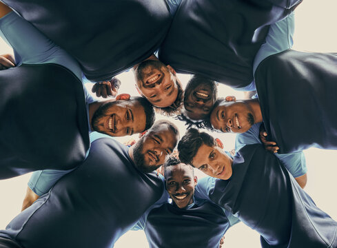 Low angle, fitness or rugby team in huddle with support or solidarity for competition, training game. Men group, happy smile or athletes in sports match or exercise together with pride or mission - Powered by Adobe