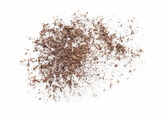 Pile of brown dust scattered on white background, top view