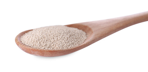 Spoon with active dry yeast isolated on white