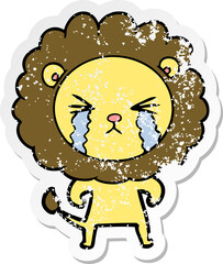 distressed sticker of a cartoon crying lion