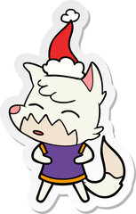 sticker cartoon of a fox wearing santa hat