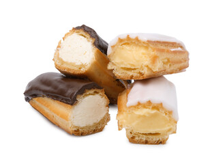 Many cut delicious eclairs isolated on white