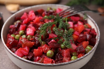 Delicious fresh vinaigrette salad in bowl, closeup
