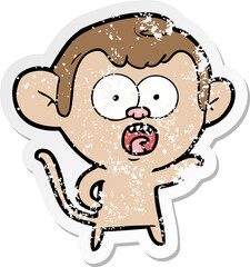 distressed sticker of a cartoon shocked monkey