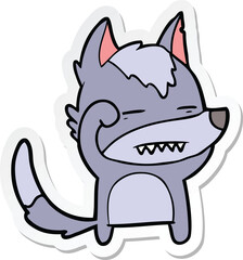 sticker of a cartoon wolf showing teeth