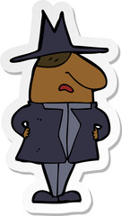 sticker of a cartoon man in coat and hat