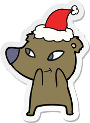 cute sticker cartoon of a bear wearing santa hat