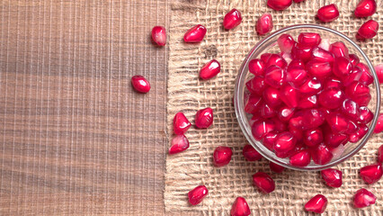 Fresh Pomegranate rich in natural antioxidants. Concept of red fruits, vitamins and natural antioxidants to the skin for beauty.

