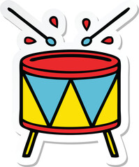 sticker of a cute cartoon beating drum