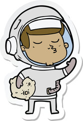 Obraz na płótnie Canvas sticker of a cartoon confident astronaut