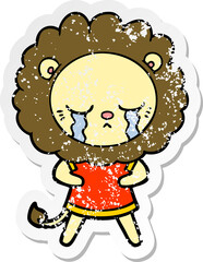 distressed sticker of a crying cartoon lion