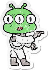 distressed sticker of a cartoon three eyed alien