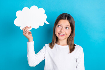 Photo of positive adorable schoolgirl with straight hairdo dressed white shirt look at mind cloud...