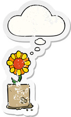 cartoon flower and thought bubble as a distressed worn sticker