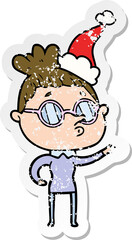 Obraz premium distressed sticker cartoon of a woman wearing glasses wearing santa hat