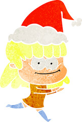 retro cartoon of a smiling woman wearing santa hat