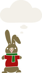 cartoon rabbit and thought bubble in retro style