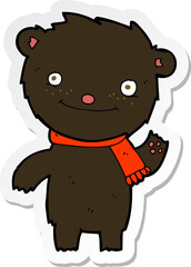 sticker of a cartoon cute black bear