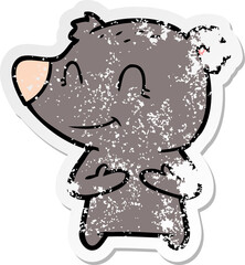 distressed sticker of a friendly bear cartoon